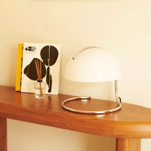 Postmodern table lamp of metal and glass