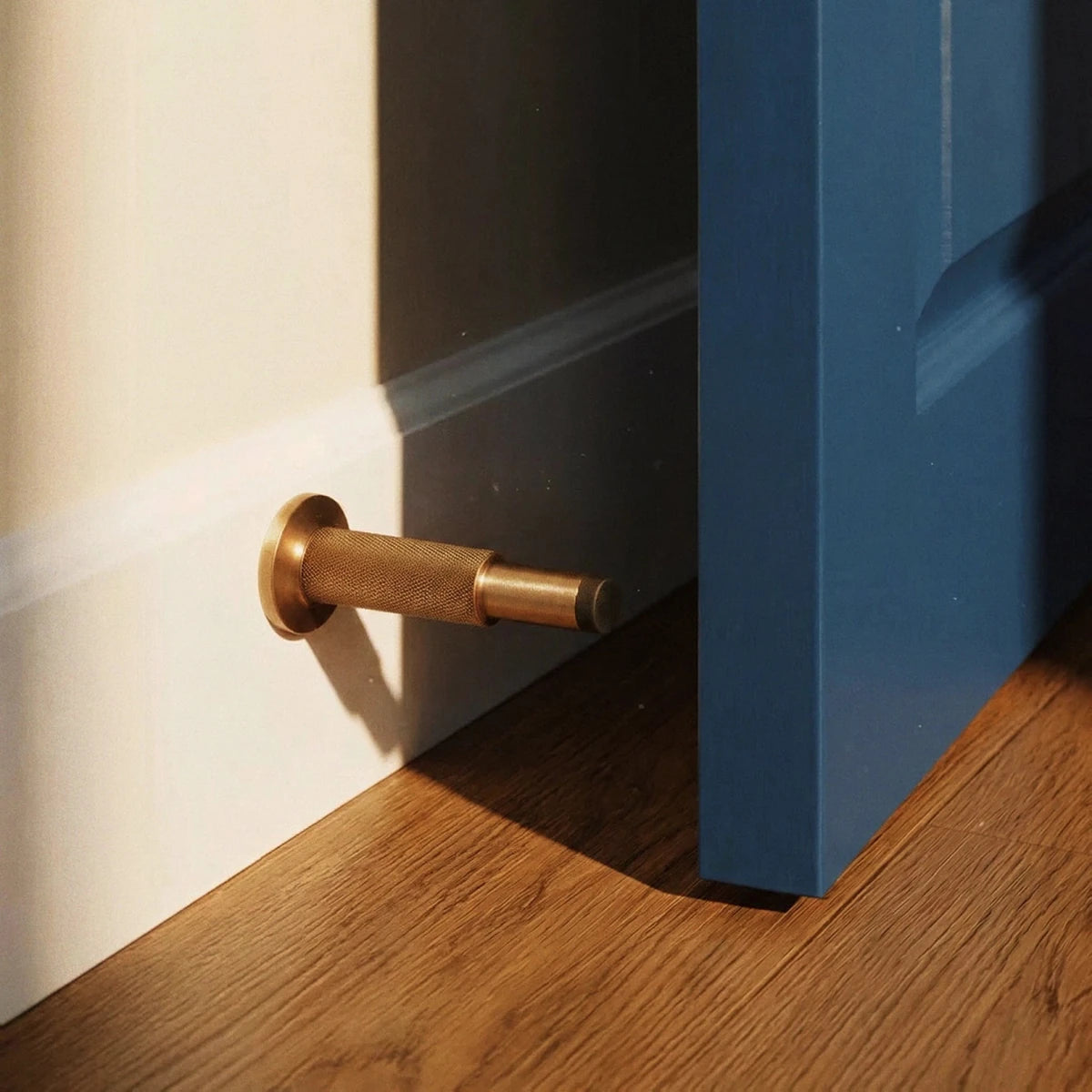 Oskarel Industrial Brass Wall Door Stop