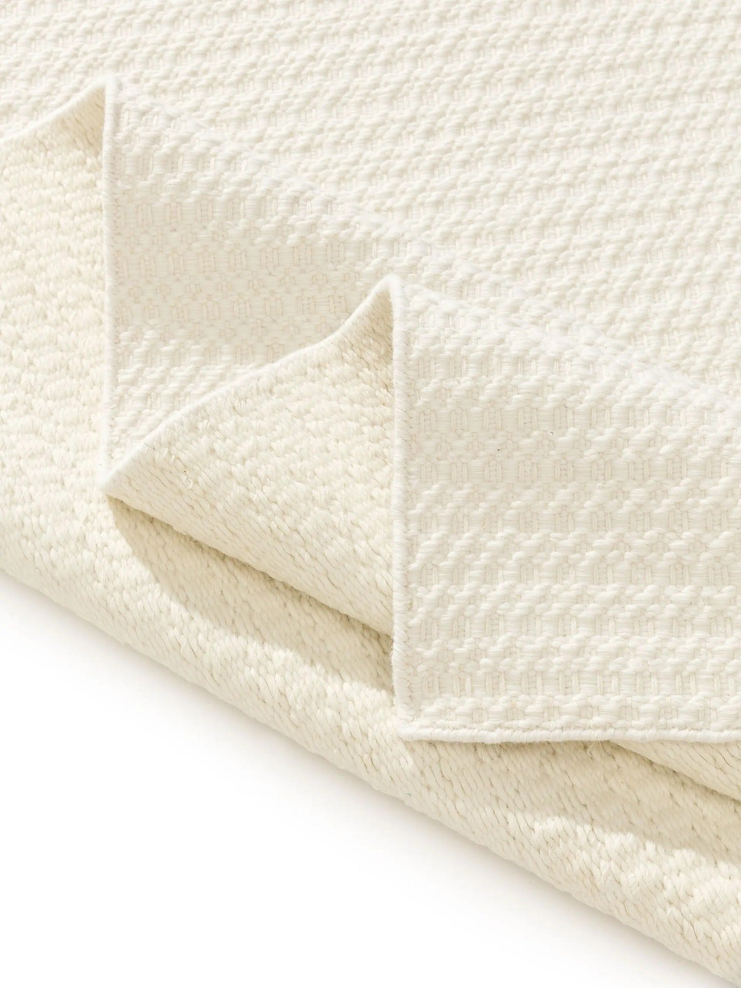 Handwoven wool rug texture