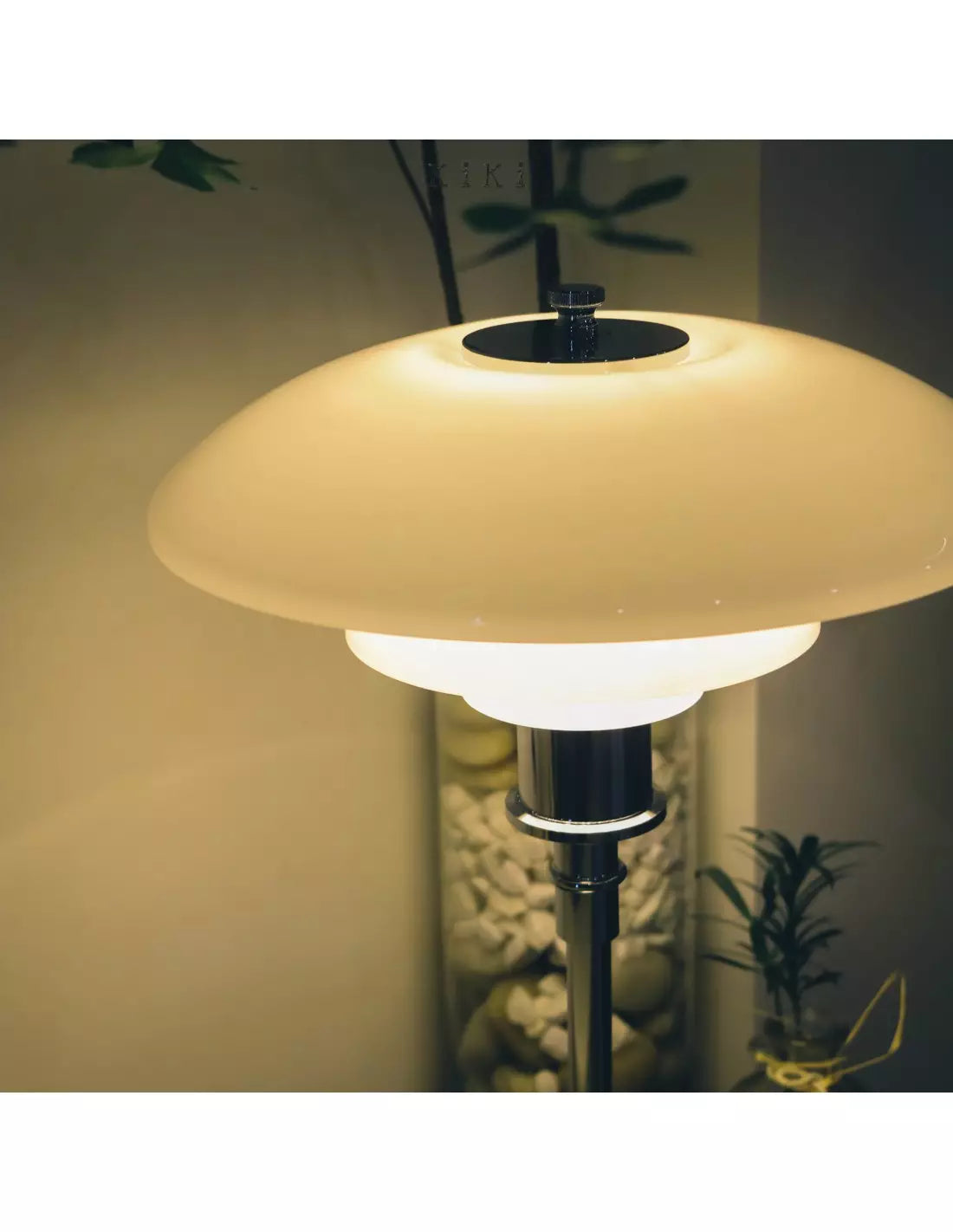 Danish metal table lamp in a disc shape