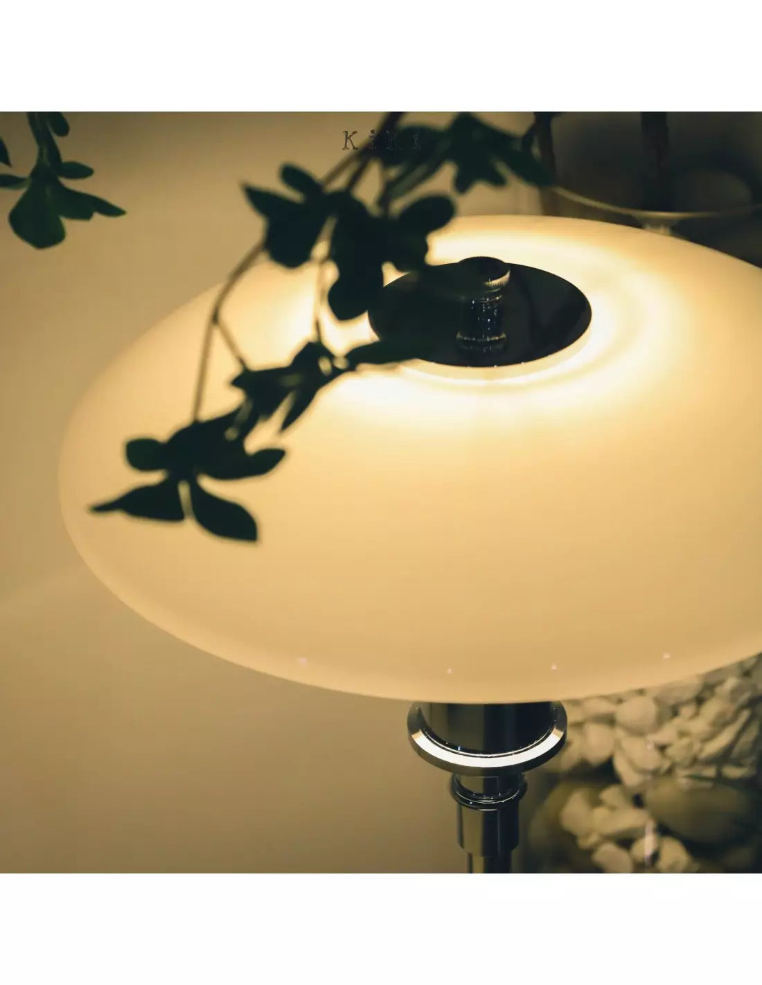 Danish metal table lamp in a disc shape